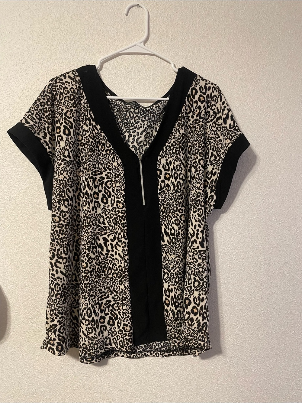 Leopard-Print V-Neck Blouse with Black Trim